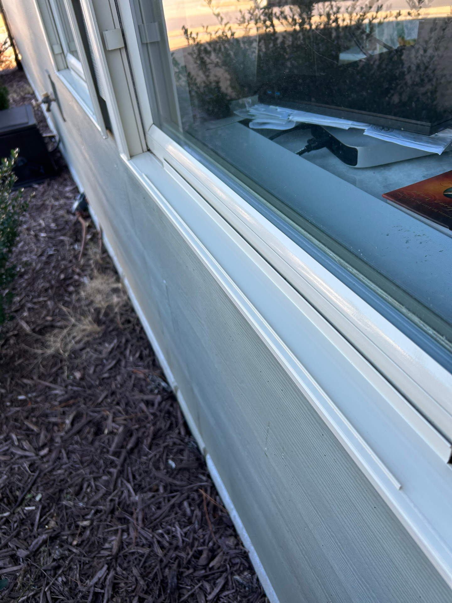 Crisp white window frame and sill after cleaning